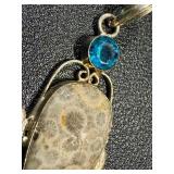 Sterling Silver Pendant with Agatized Coral and Topaz Accent