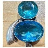 Pair of Blue Gemstone Silver Pendants with Unique Designs