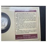 Portraits of Liberty Card with COA 1998 Silver Dollar and 1974 Statue of Liberty Stamp