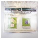 Decorative Collectors Folder with 6 Uncirculated Sacagawea dollar coins and vintage stamps