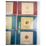 collection of 6 Gold plated US coins: 3 Indian Head Pennies and 3 Presidential Dollars