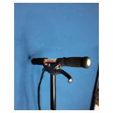 Razor Power Core E90 electric scooter in black and green.