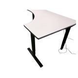 Power Sit Stand Desk with Memory Settings Left Return that measures 70" wide / 46" deep / Adjusts between 24.5" to 50" tall