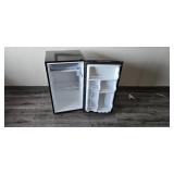 Avanti Mini Fridge with Freezer and a dimension of 19"L x 18"W x 24"H