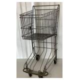 Two Vintage Child Sized Shopping Carts