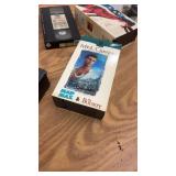 Large Collection of Vintage VHS Tapes Including Hitchcock, Dean Martin, Jaws, and More
