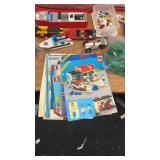 Large Collection of Vintage LEGO Bricks, Sets, Baseplates, and Manuals