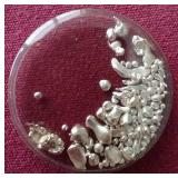 Small Capsule of Silver Grains