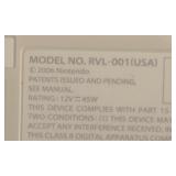 O - Nintendo Wii RVL-001 Console with 2 Remotes, NERF Sports Attachments and Power Adapter