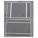 G - Set of 4 Rectangular Rugs with Black and Tan Patterns