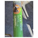 G - Collection of 9 Yard and Garden Tools Including Shovel, Post Hole Digger, Tampers, and Rakes