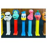BS - Collection of 12 Assorted PEZ Dispensers and PEZ for Pets Dog Treat Dispenser