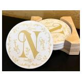 K - Collection of 11 Monogrammed Coasters and Tiles