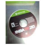 Four Xbox One video game items, including used copies of "Skate," "The Sims 4 Deluxe Party Edition," "Inside," and a disc for "NBA 2K20".