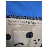 Fisher-Price Glow and Grow Kick & Play Piano Gym baby playmat.