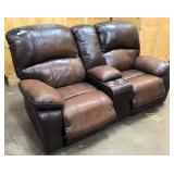 Brown Leather reclining love seat