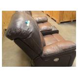 Brown Leather reclining love seat