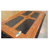 Two toned wood coffee table with glass inserts