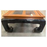 Two toned wood coffee table with glass inserts