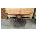 Vintage wood table with metal legs and casters, and 4 solid wood chairs
