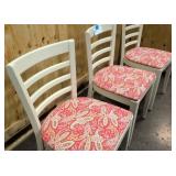 3 solid white wooden chairs with floral seat