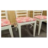 3 solid white wooden chairs with floral seat