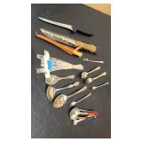 Misc knifes, silverware, and measuring spoons