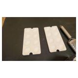 two Cheese graders, two Egg dishes, slicer, and press