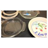 4 pie pans and 2 pie crust shields