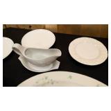 Large ceramic platter, gravy boat with plate, ceramic dish with cover, 3 misc plates