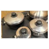 Wok with cover, misc pots and covers