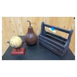 Rustic living décor = small wooden globe, large painted metal pear, and rustic wooden box with handle