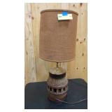 Antique log and metal lamp