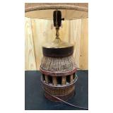 Antique log and metal lamp