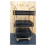 Gold and black rolling metal tea cart 30" tall,  14 wide, and 16.5