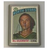 1976 Topps Autographed (Bill GOLDSWORTHY) NORTH STARS Trading Card (In Protective Sleeve)