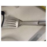 Collection of Grill and Pizza Accessories Including Little Griddle, Baskets, Spatula, and Pizza Peel