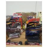 Collection of 16 Die-Cast Cars Featuring Hot Wheels, Batman, Coca-Cola, and NASCAR