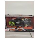 Collection of 4 Die-Cast Vehicles Including Harley-Davidson Trucks and Dale Earnhardt Stock Car