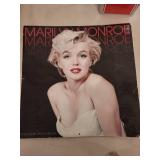 Vintage Collectibles Lot with 1992 Coca-Cola Napkin Dispenser, Marilyn Monroe Calendar, Hard Rock Cafe Menu, and More