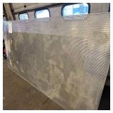 Sheet of metal apear to be Aluminum