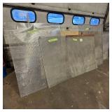 Sheets of metal apear to be Aluminum