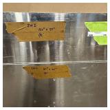 Sheets of metal apear to be Aluminum