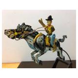 Hand Painted Metal Balancing Cowboy on Horse Display