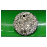 1891 Morgan Silver Dollar, has a hole drilled in it