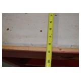 Red Wall-Mount Plate Rack and Ornate Wood Mirror