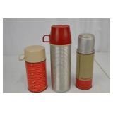 Vintage Thermos Bottles Trio Including Hiawatha and Happy Home