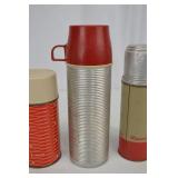 Vintage Thermos Bottles Trio Including Hiawatha and Happy Home