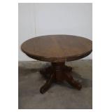Round Oak Dining Table with Four Curved Legs