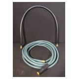 Collection of Lawn and Garden Supplies Including Hose, Mulch Film, Extension Cord, and Accessories